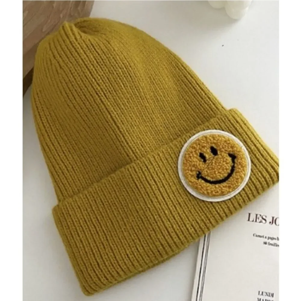 Knit ribbed smiley face hat beanie, mustard